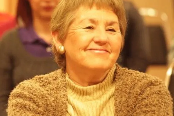 A woman smiling after the meditation at UAdeC
