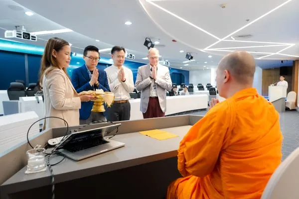 The team standing for the offering