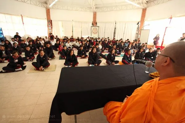 Older students sitting for the meditation at Simón Bolívar School