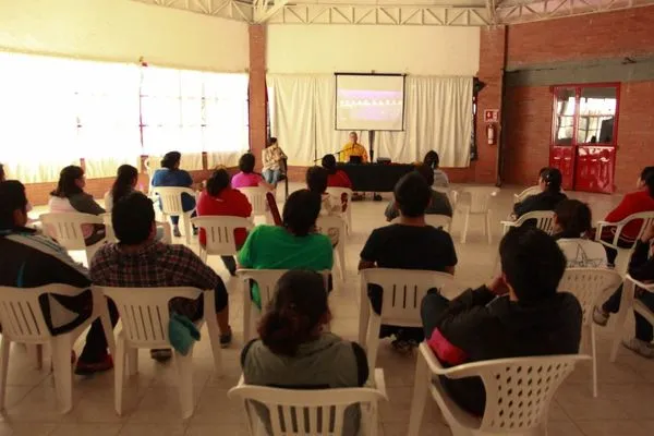 Teachers and staff gathered at Simón Bolívar School