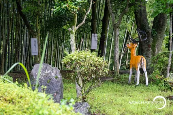 A deer in the bamboo garden — a wooden one, the only deer I met